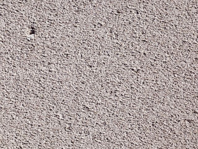 Textura de árido fino de un sendero de hormigón drenante
